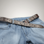 Oni & Ronin Leather Belt featuring laser-engraved Japanese samurai motifs, Oni demon face, koi fish, Oda Nobunaga family crest, Mount Fuji, Japanese crane, waves, clouds, and Kanji characters 鬼 (Demon) and 浪人 (Ronin) on premium oil pull-up leather